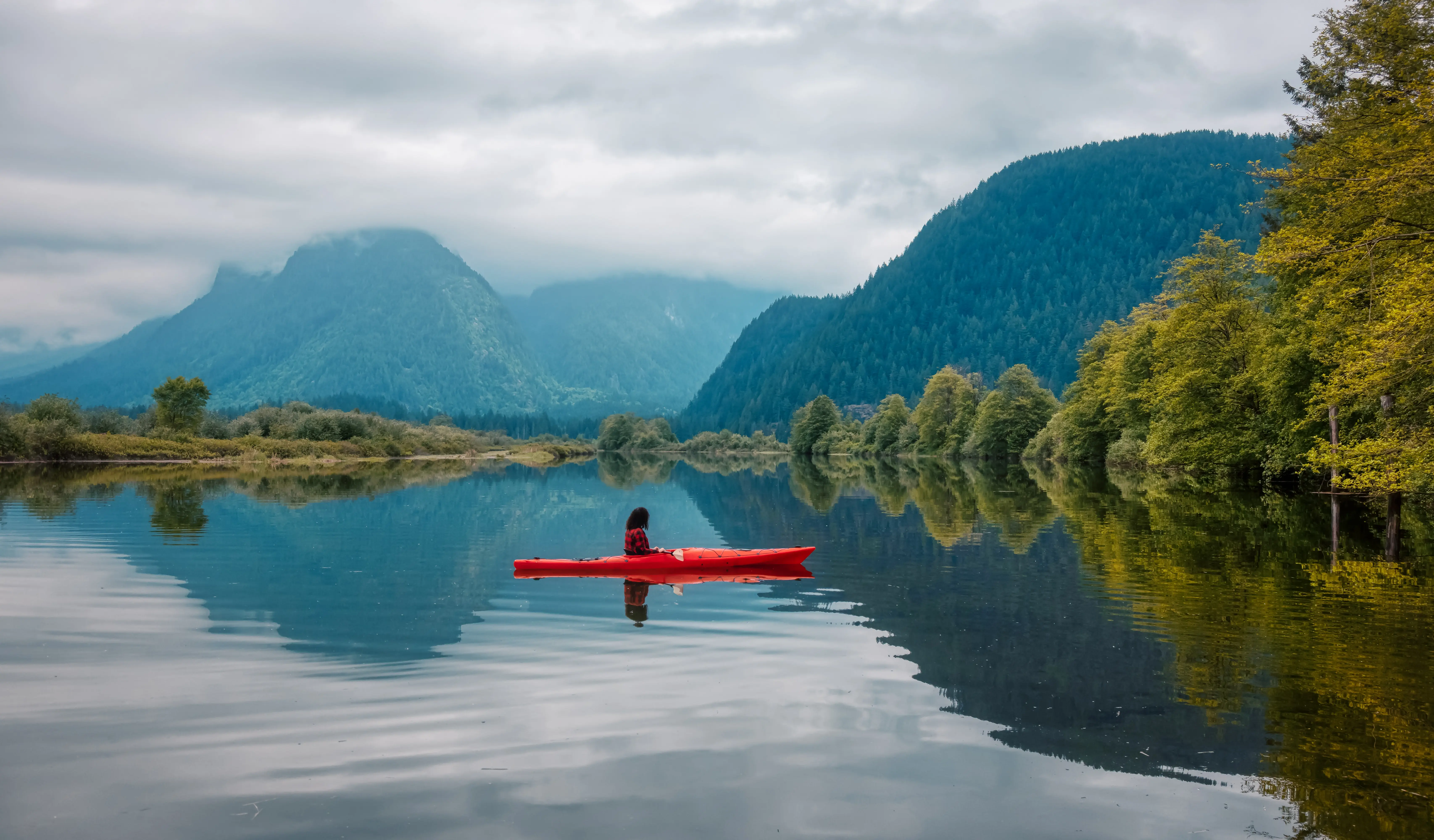adventure-caucasian-adult-woman-kayaking-in-red-ka-2025-03-15-16-21-19-utc