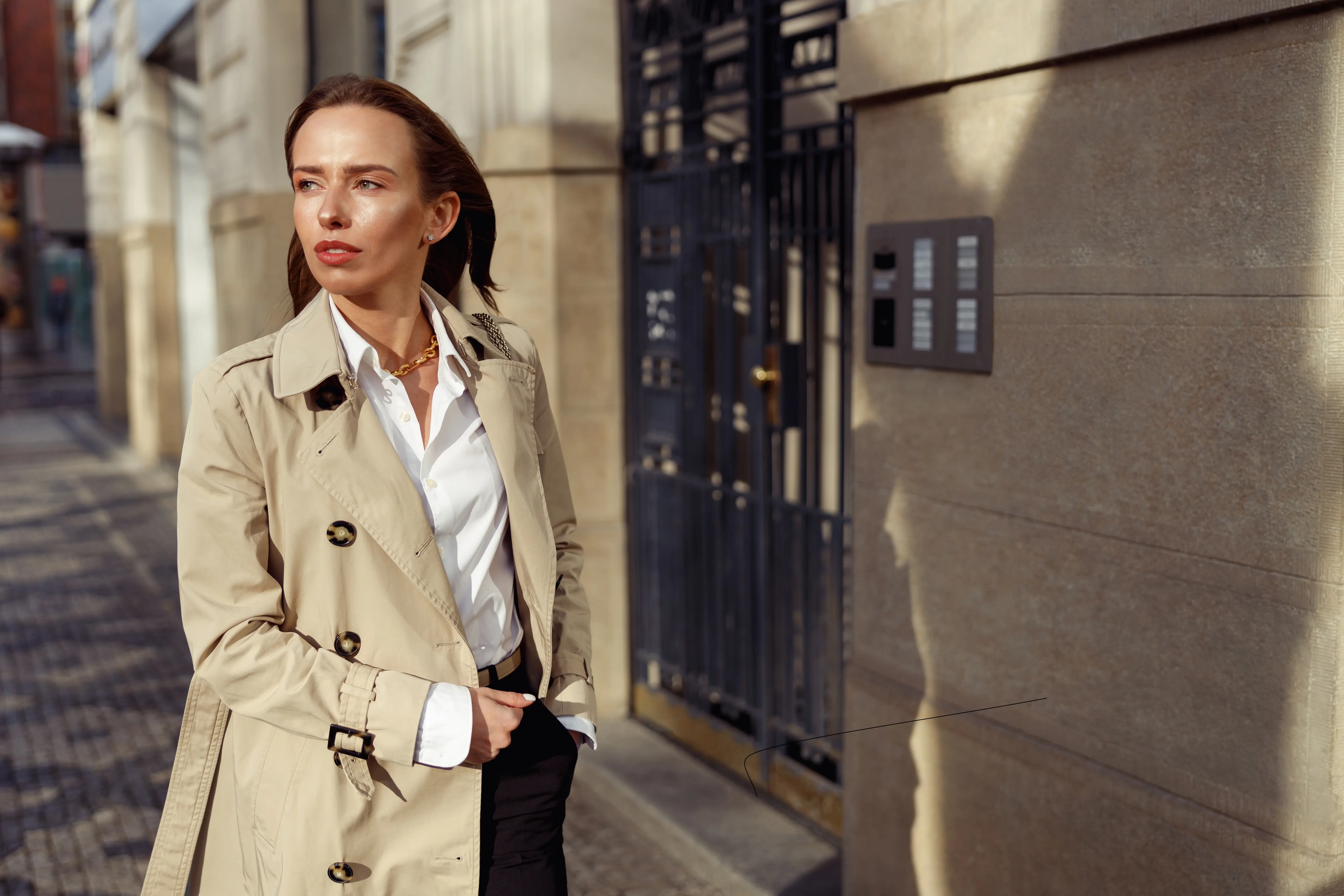 attractive-woman-in-coat-crossing-the-city-street-2024-10-18-08-13-08-utc