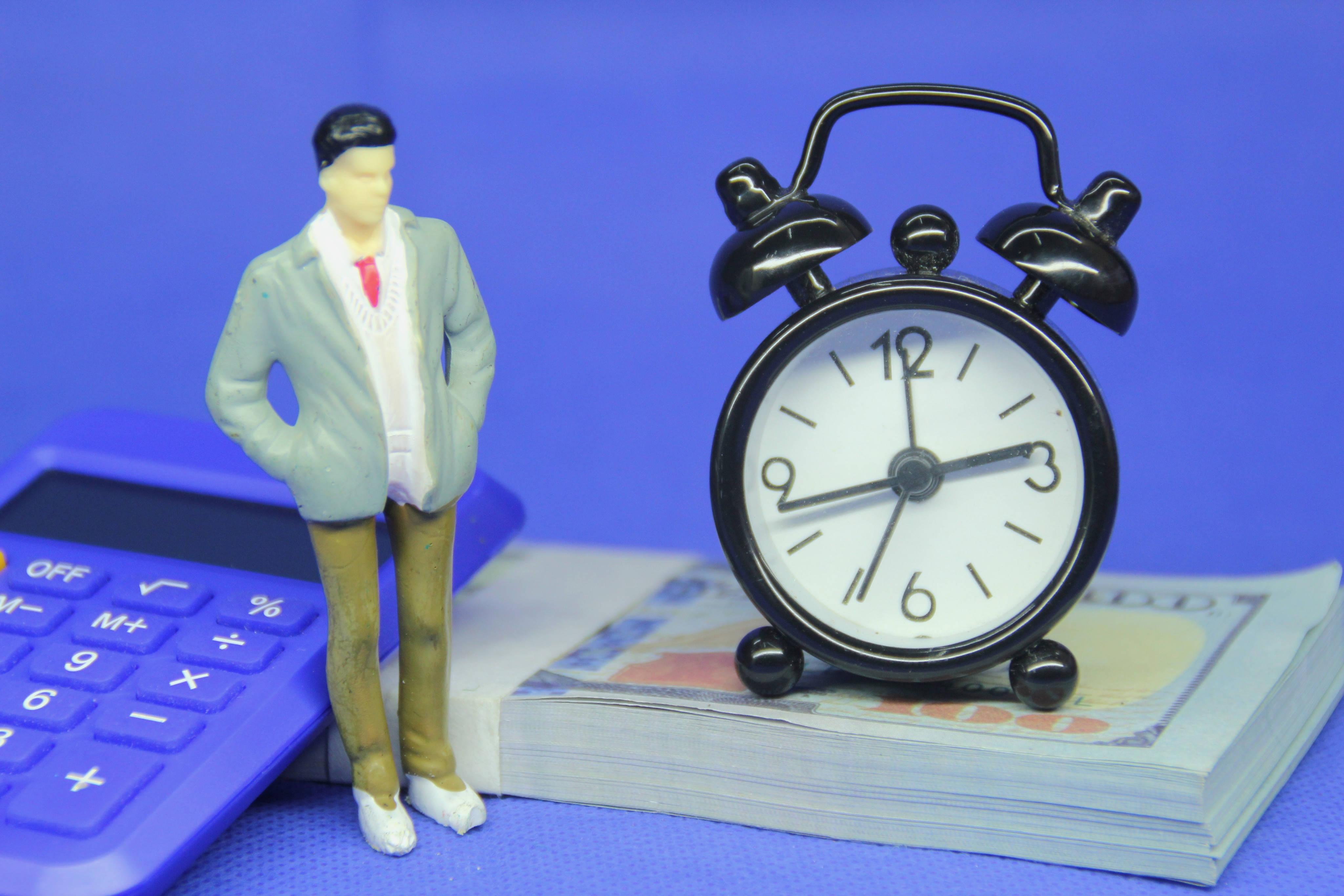 businessmen-with-money-calculators-and-time-the-2025-03-05-01-57-11-utc