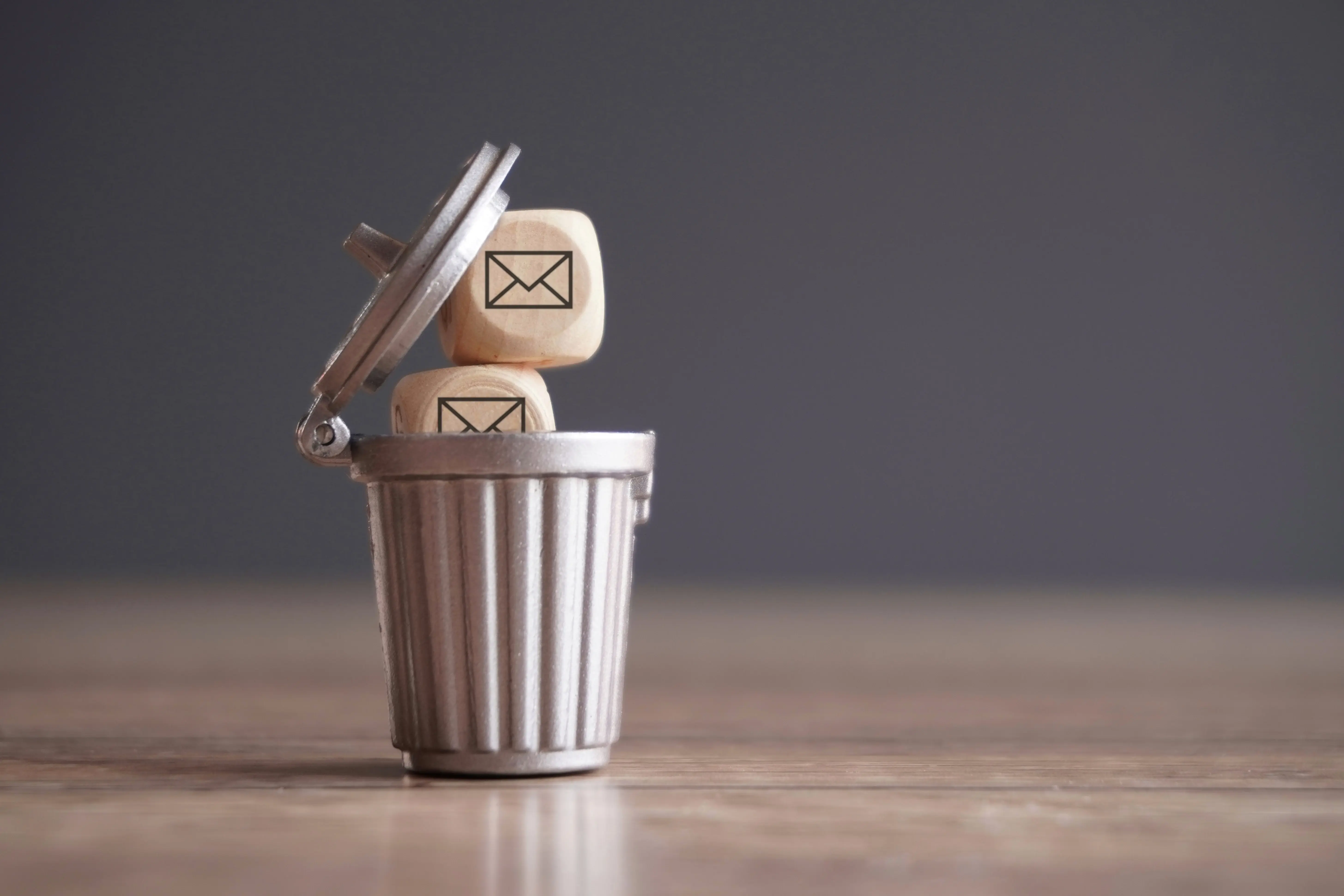 closeup-image-of-wooden-cube-with-mail-icon-inside-2025-03-15-00-04-26-utc