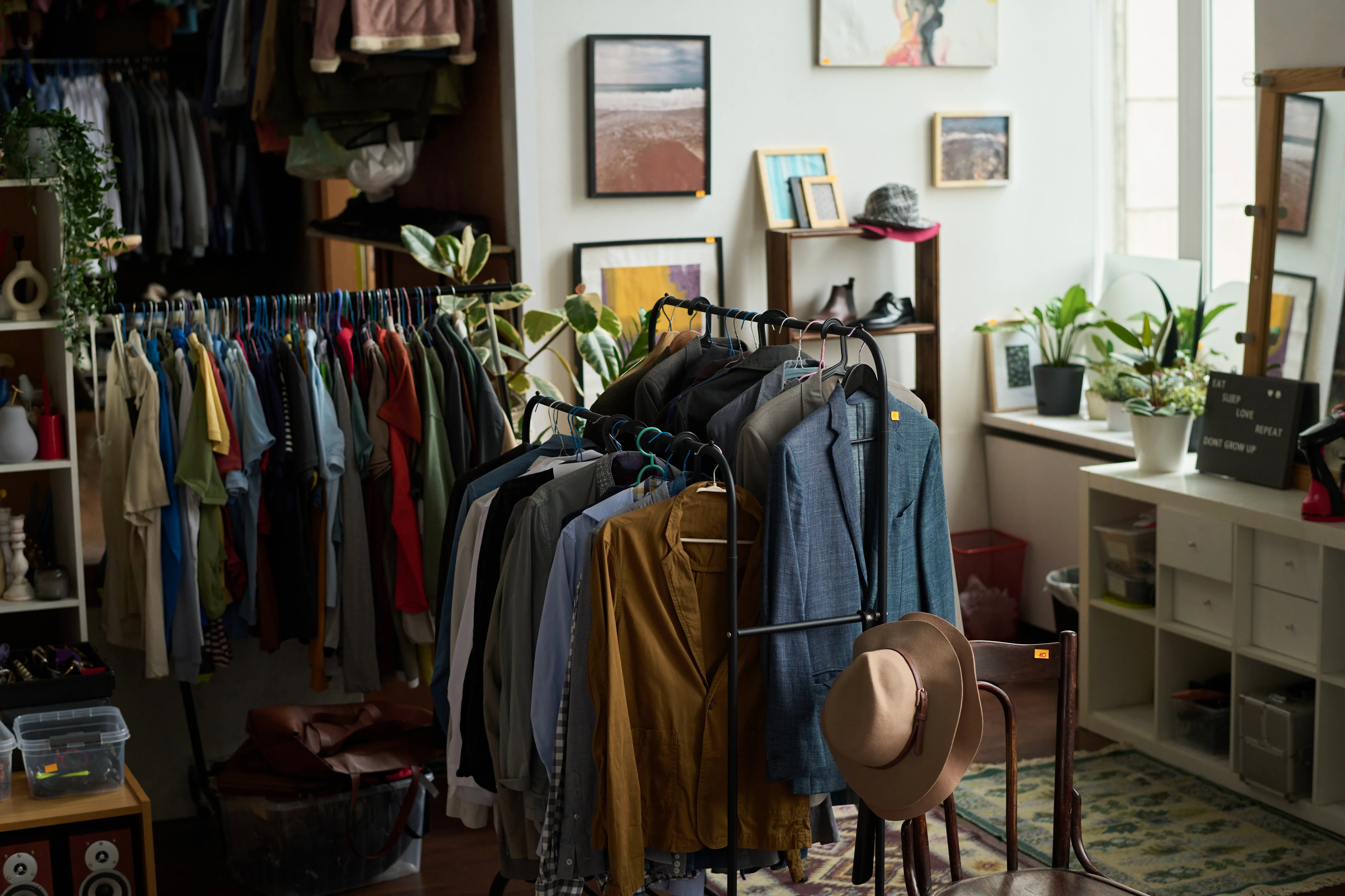 several-racks-with-secondhand-apparel-2025-03-16-12-23-00-utc