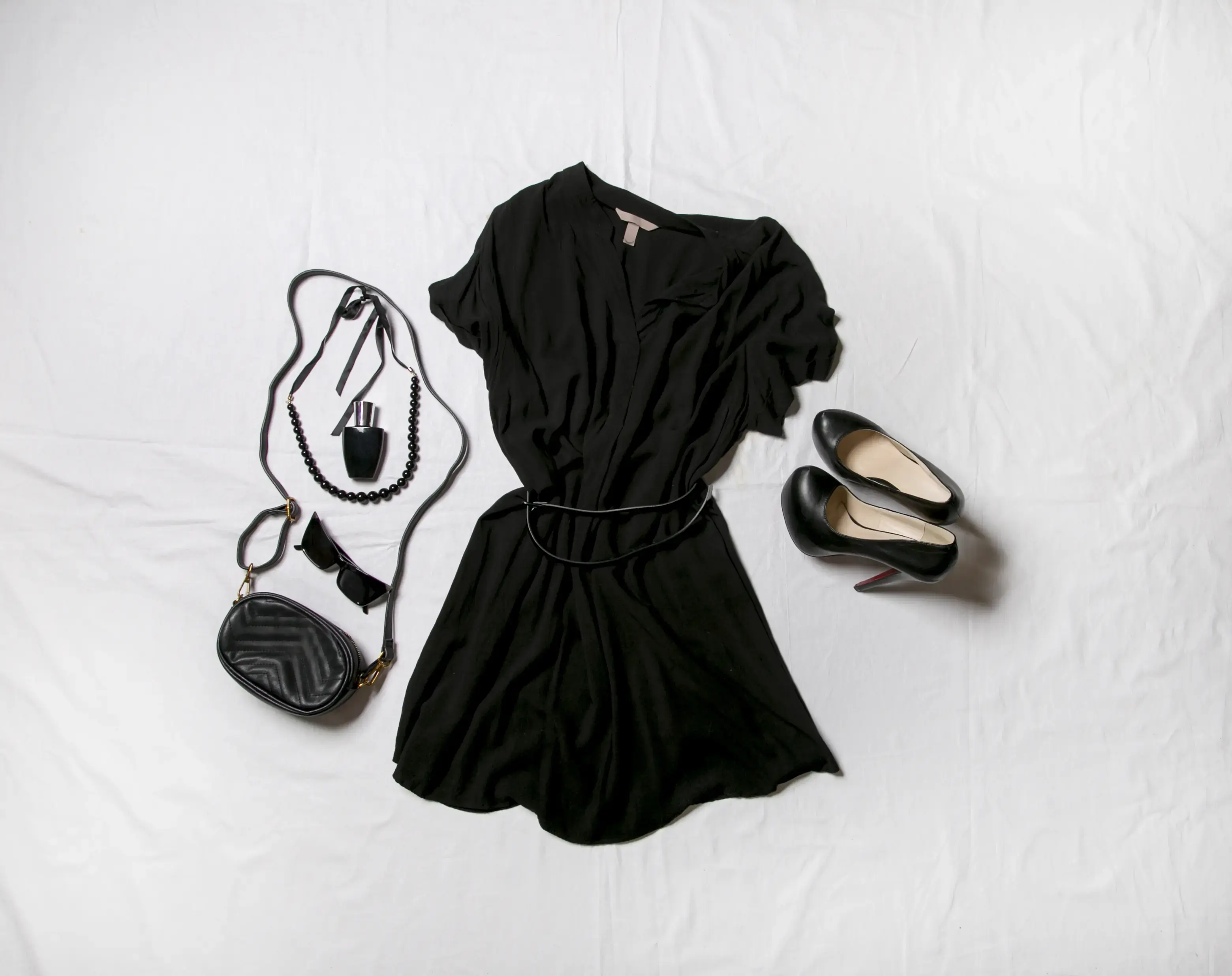 stylish-female-clothes-and-accessories-on-white-ba-2024-11-27-22-50-29-utc