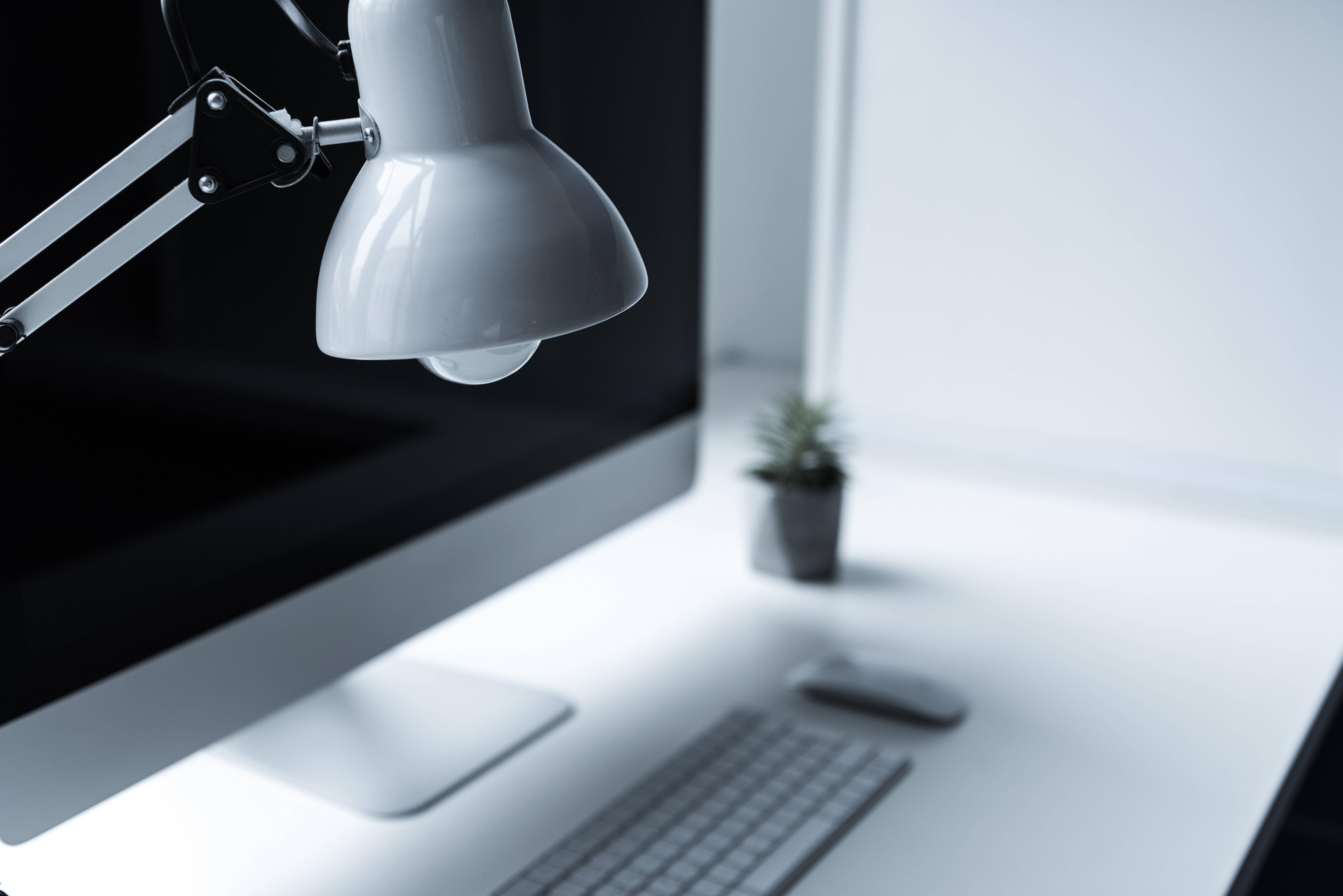 white-switched-off-table-lamp-at-working-table-2024-11-17-20-02-36-utc