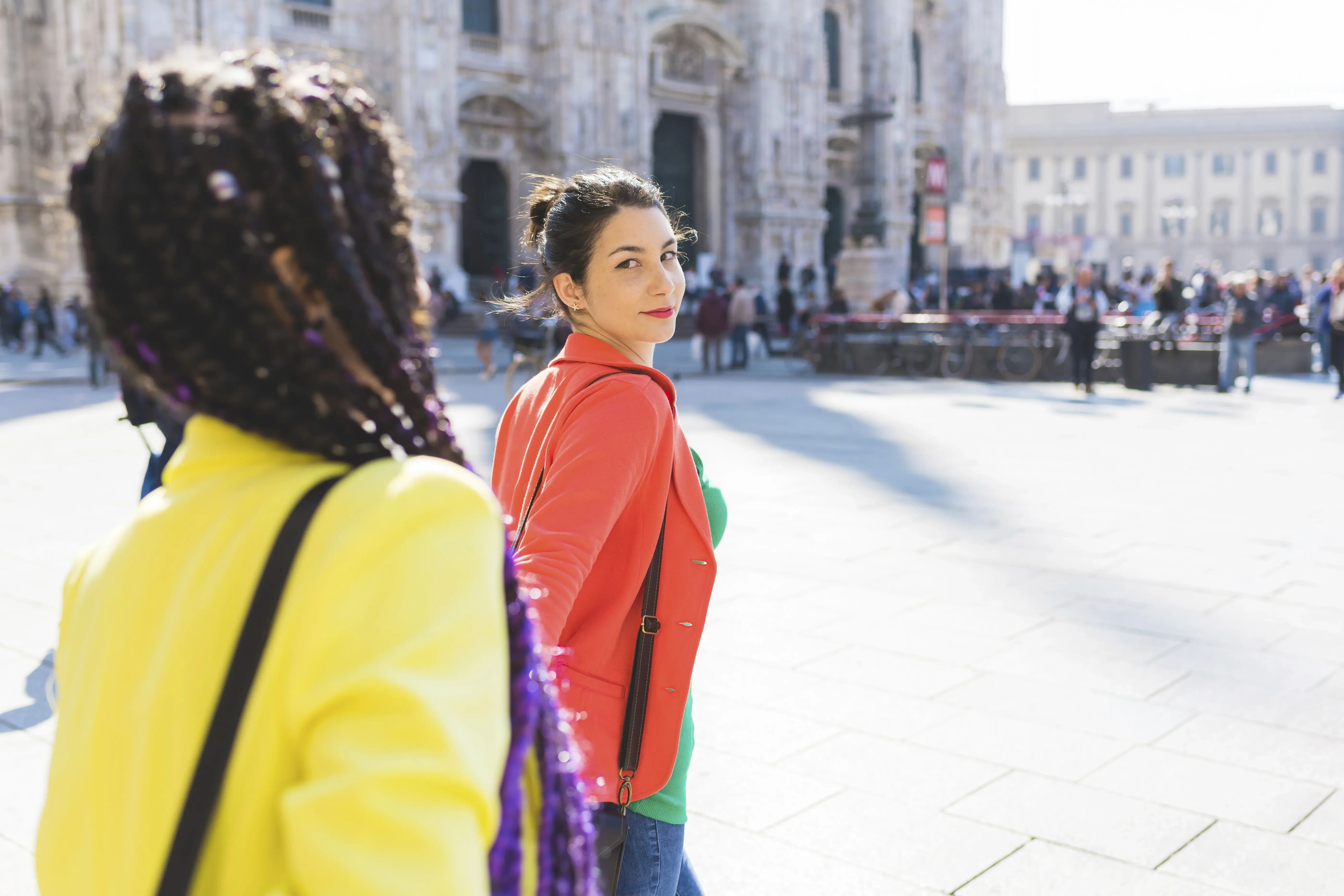 women-outside-il-duomo-milan-italy-2025-04-04-09-56-38-utc